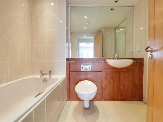 This two-bedroom flat at Warnes, Steyne Gardens, Worthing, has two bathrooms and two reception rooms. It has just come on to the market with Michael Jones Estate Agents at £525,000.