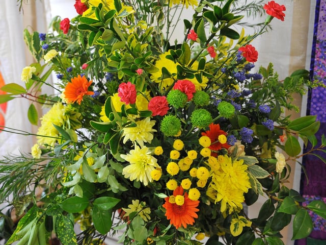 To celebrate the Queen's Jubilee a Flower and Quilt show in St Mary's Church with flower arrangements by Worthing Flower Club and quilted banners by Chris Diebel. Pic S Robards SR2206021