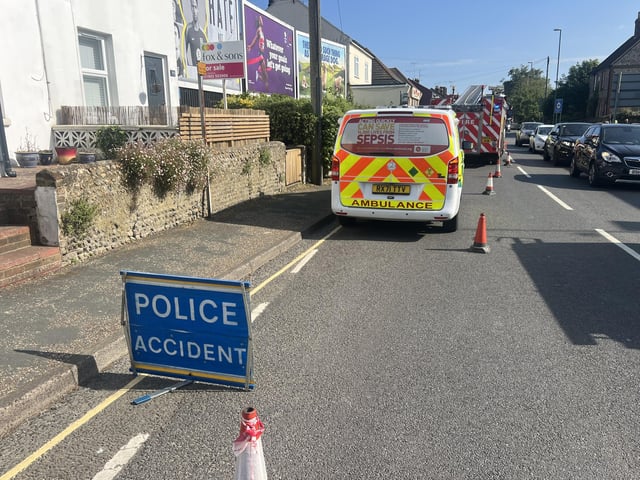 Two people taken to hospital after car collides with building in West Sussex