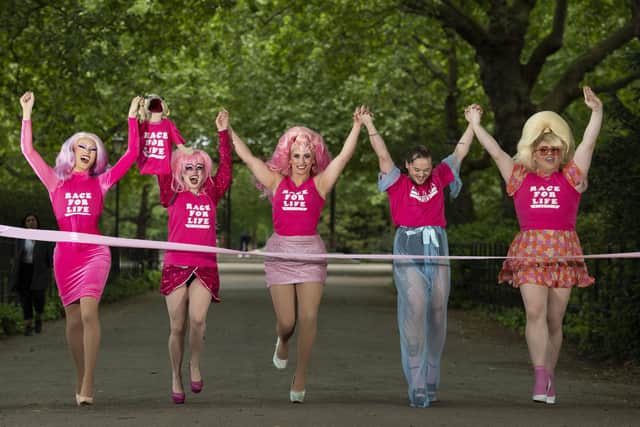 Brighton drag queens Scarlett Fever (second from the left) and Boss (second from the right) joined River Medway, Ella Vaday, and Kitty Scott-Claus at Battersea Park, London