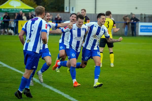 Haywards Heath Town celebrate scoring against Chichester City on Saturday. Picture by Ray Turner