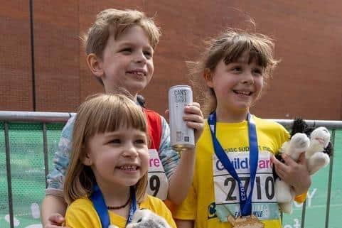 Hector Downes, nine, his sister Polly, five, and their cousin Flo Brehaut, eight, completed the Worthing Family Mile