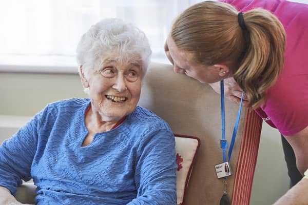 A carer with a resident. Picture: Guild Care