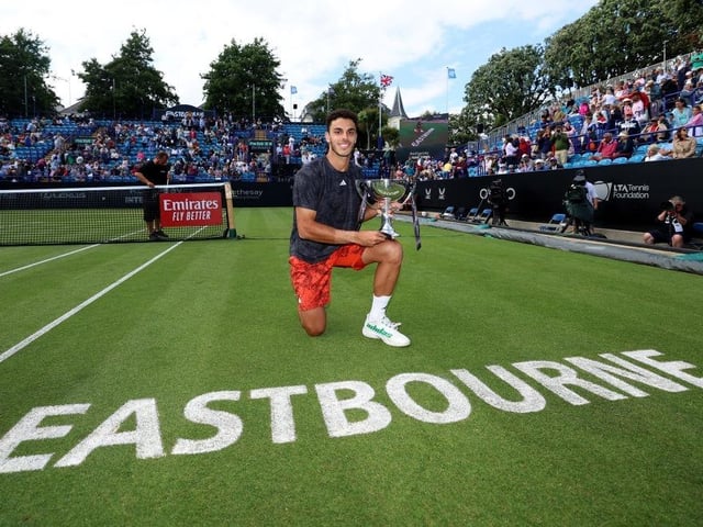 EASTBOURNE, ENGLAND - JULY 01: Francisco Cerundolo of Argentina celebrates with the trophy after winning the mens singles final against Tommy Paul of the United States during Day Eight of the Rothesay International Eastbourne at Devonshire Park on July 01, 2023 in Eastbourne, England. (Photo by Tom Dulat/Getty Images for LTA):Action from Saturday's finals at the Rothesay tennis international at Devonshire Park, Eastbourne