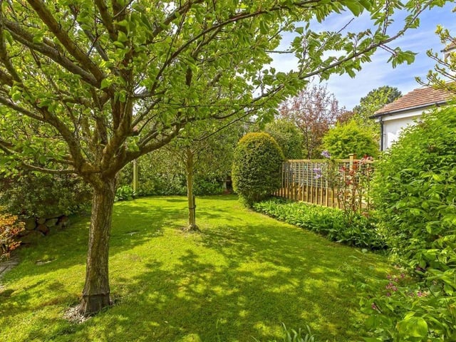 This end-of-terrace, five-bedroom property is on a corner plot in Grand Avenue, just a short walk from the town centre and yards from the beach. It has come on the market with Robert Luff & Co priced at £850,000.