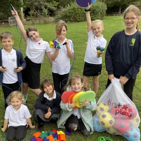 Pupils at Glebe Primary School in Southwick with some of the new sports equipment donated by Shoreham and Southwick Rotary Club