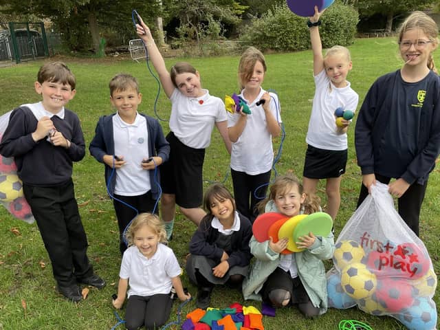 Pupils at Glebe Primary School in Southwick with some of the new sports equipment donated by Shoreham and Southwick Rotary Club