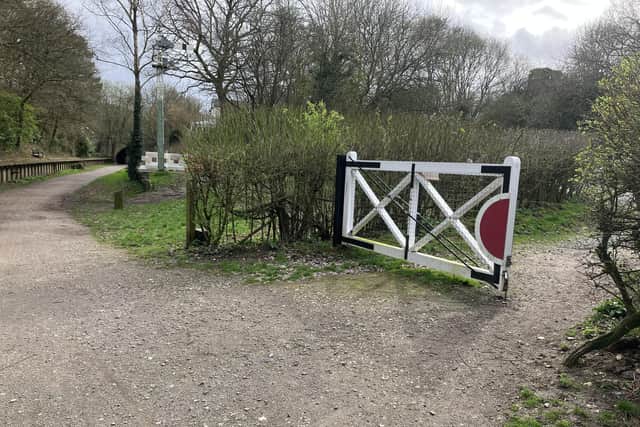 An old crossing gate and a railway signal can still be seen at the old West Grinstead trains Station which now forms part of the Downs Link footpath