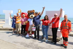 Representatives of the Air Ambulance Charity Kent Surrey Sussex (KSS), Eastbourne Dementia Action Alliance, Rotary Club of Sovereign Harbour, Hailsham Rotary Club, Cllr Margaret Bannister and Ace the Air Bear launch the charity collections for Airbourne 2023. Picture from Eastbourne Borough Council