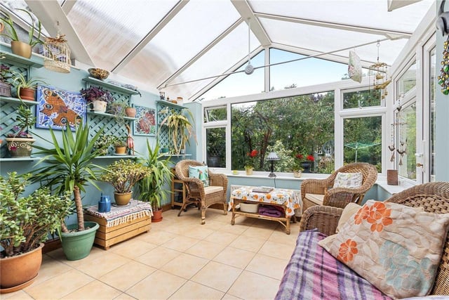 The property's large conservatory, which leads out into the generous garden.