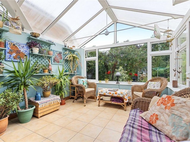 The property's large conservatory, which leads out into the generous garden.