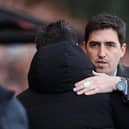 Andoni Iraola, Manager of AFC Bournemouth, embraces Roberto De Zerbi, Manager of Brighton & Hove Albion, during the Premier League match