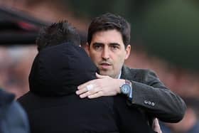 Andoni Iraola, Manager of AFC Bournemouth, embraces Roberto De Zerbi, Manager of Brighton & Hove Albion, during the Premier League match