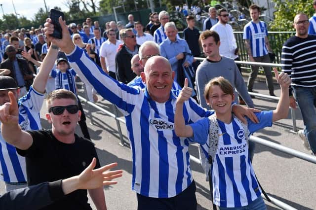 Brighton fans arrive for their first Premier League game against Manchester City on August 12, 2017.