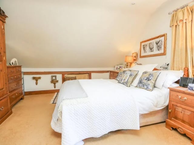 This five bed converted barn in Anmore Road, Denmead is on the market for £1.4m. It is listed on Zoopla by White & Guard Estate Agents.