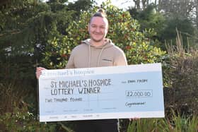 Prize winner with cheque.