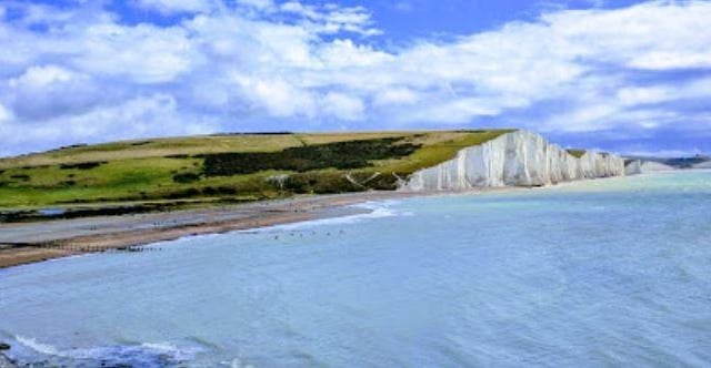 Experience the breathtaking white chalk cliffs and rolling green hills of the Seven Sisters Country Park. Enjoy scenic walks, picnics, and panoramic views of the English Channel