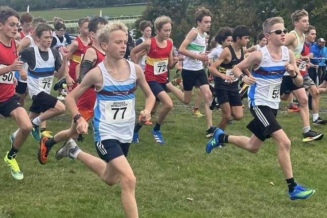Eastbourne Rovers juniors at the head of the cross country field at Goodwood