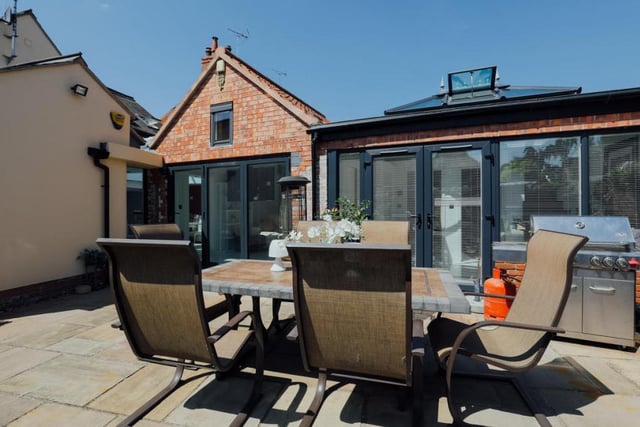 The enclosed courtyard at the back of the Southwell property is perfect for entertaining guests. A patio area offers plenty of room for alfresco dining or barbecues.