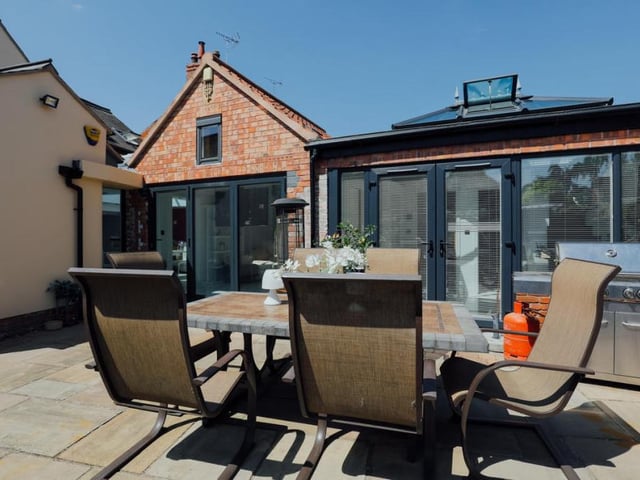 The enclosed courtyard at the back of the Southwell property is perfect for entertaining guests. A patio area offers plenty of room for alfresco dining or barbecues.