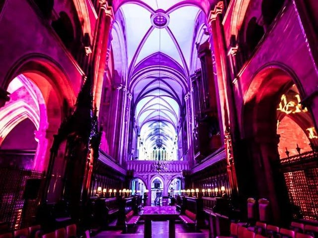 The nave, arches and sacred spaces are alive with light and colour
