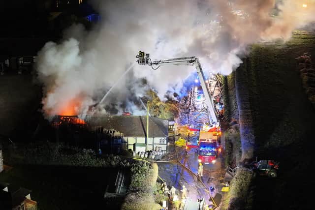 Crews have been working hard throughout the night and the fire is now under control, the fire service said. Photo: Eddie Mitchell