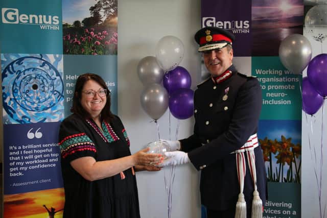 Jacqui Wallis receives the Kind Award from HM Lord-Lieutenant of East Sussex, Mr Andrew Blackman