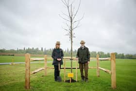 Lord and Lady Cowdray plant a Red Oak to mark the coronation of King Charles III