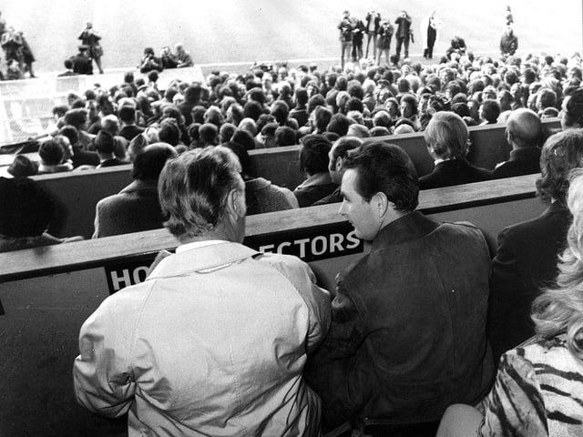 Brian Clough, manager of Brighton And Hove Albion Football Club, and his assistant, Peter Taylor, watch their team play York City from the stands on 3rd November 1972:
