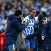 Joao Pedro of Brighton & Hove Albion celebrates with team mates after the final whistle against Fulham at the Amex Stadium