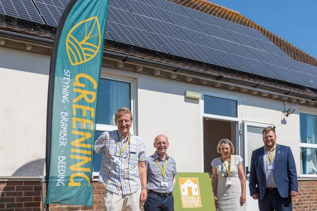 Pictured is Councillor Wright with Geoff Barnard from local environmental group Greening Steyning, Frank Bull who managed the hall’s Community Climate Fund project and Sue Alberyn, chairman of the trustees of Beeding and Bramber Village Hall.