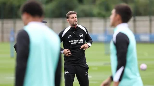 Looking Fab: Brighton boss Fabian Hurzeler leads the training session