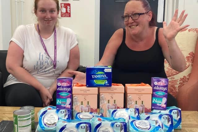 Sanctuary Supported Living staff Linsey Lower and Kerry Lower with the donations.