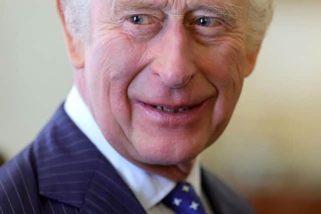 Britain's King Charles III attends a reception at Clarence House in London on February 23, 2023