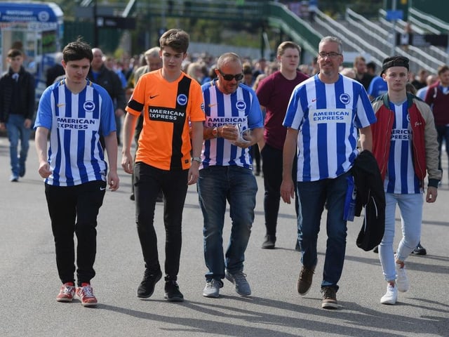 Fans walk outside the stadium prior to the Premier League match between Brighton and Hove Albion and Newcastle United at Amex Stadium on September 24, 2017.