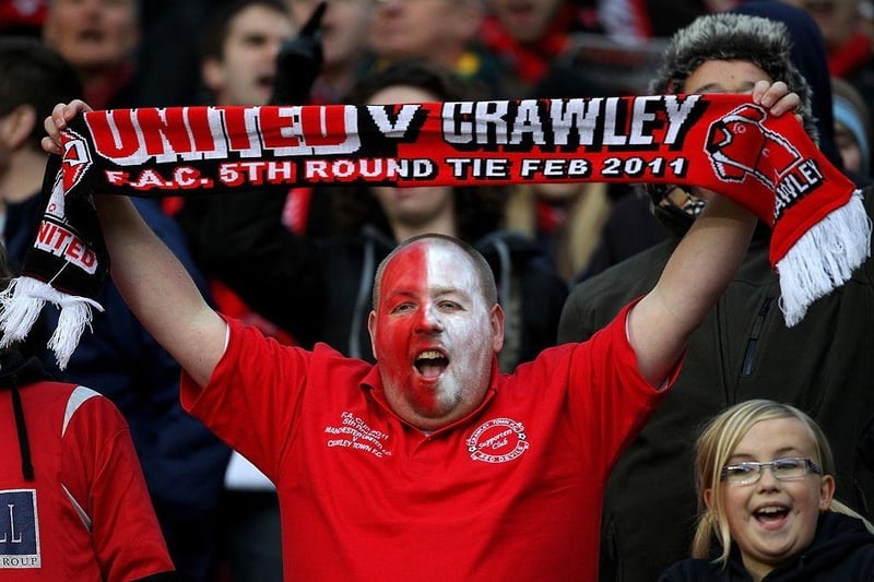 Crawley Town fans soak up the atmosphere.