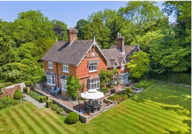The Old Vicarage in Rudgwick is set within stunning landscaped gardens. It is on sale through agents Savills with a guide price of £2,450,000.