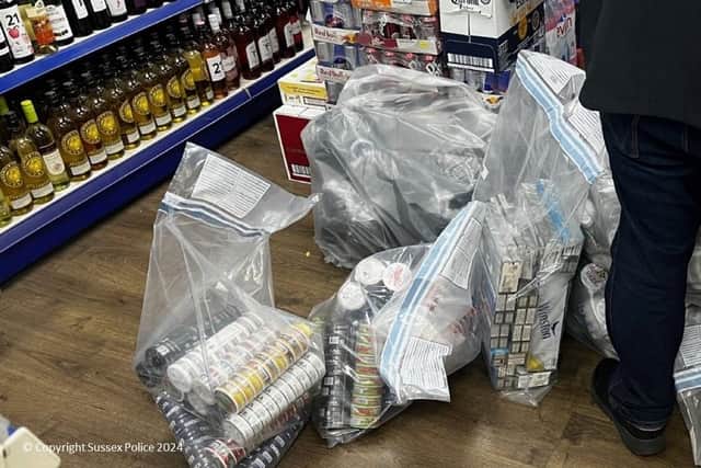 Thousands of pounds worth of cigarettes and vapes were confiscated and £10,000 was seized during two days of action in Crawley. Pictures courtesy of Sussex Police
