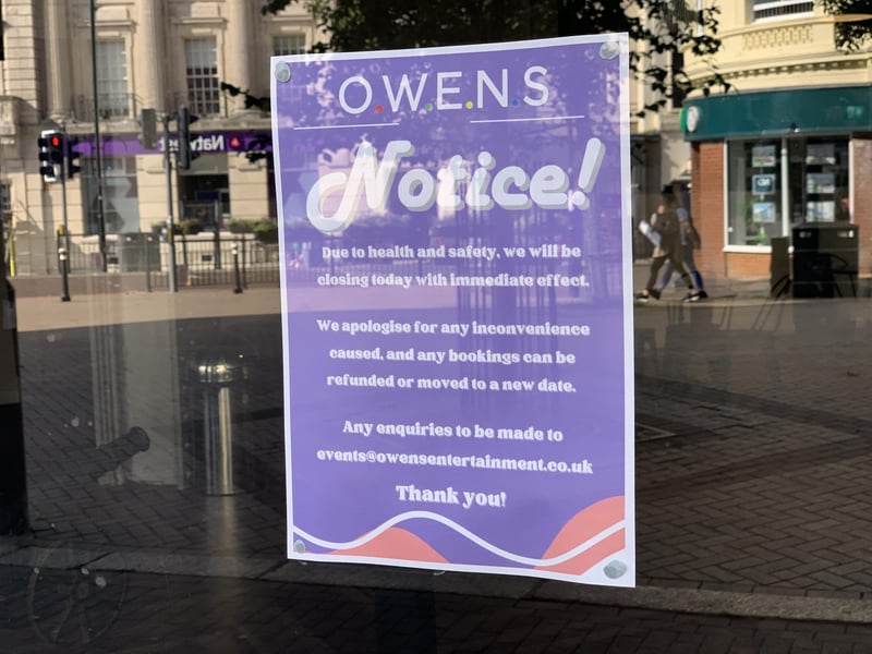 The sign on Owens' window.