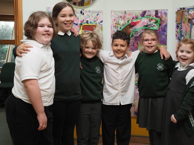 Pupils celebrate £5,000 grant for specialist equipment.