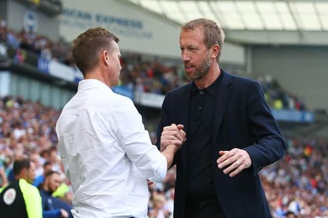 Brighton and Hove Albion head coach Graham Potter and a frustrated Leeds boss Jesse Marsch after Albion's 1-0 Premier League win