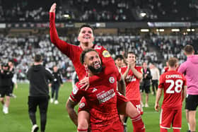 Crawley Town midfielder Liam Kelly (4) celebrates victory with Crawley Town defender Kellan Gordon (2) during the EFL Sky Bet League 2 play-off second leg match between Milton Keynes Dons and Crawley Town at stadium:mk, Milton Keynes, England on 11 May 2024 | Picture: Dennis Goodwin/ProSportsImages