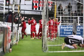 Worthing's players and fans celebrate one of the two goals that defeated Bath City | Picture: Mike Gunn