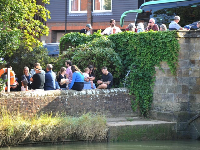 Crowds gather ahead of the Arundel RNLI Duck Race on Bank Holiday Monday.