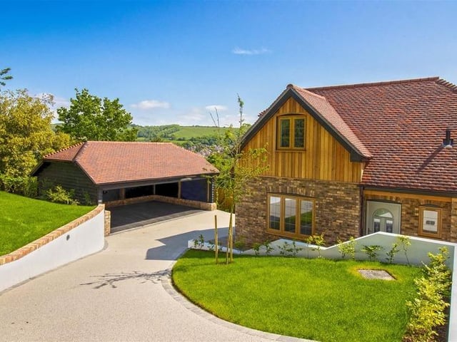 Offers in excess of £925,000 are invited for this new luxury property in Mill Lane, High Salvington. It has beautiful views over the South Downs, versatile and spacious accommodation.