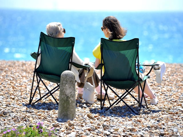 Enjoying the heatwave on Worthing beach. Pic S Robards SR2206152