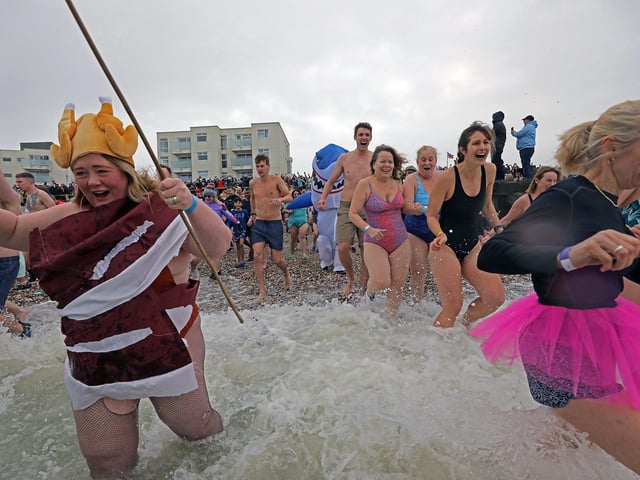 Some 385 people braved the ice cold sea water on New Year's Day 2024