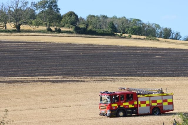 Firefighters successfully extinguished a fire in a field at Upwaltham, close to the A285. Photo: Jack Chiverton