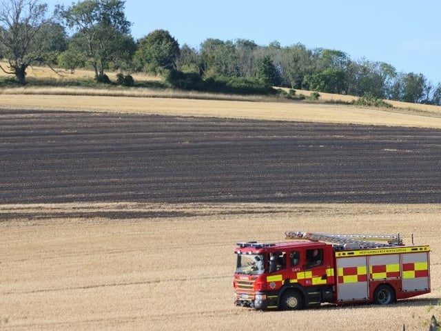 Firefighters successfully extinguished a fire in a field at Upwaltham, close to the A285. Photo: Jack Chiverton