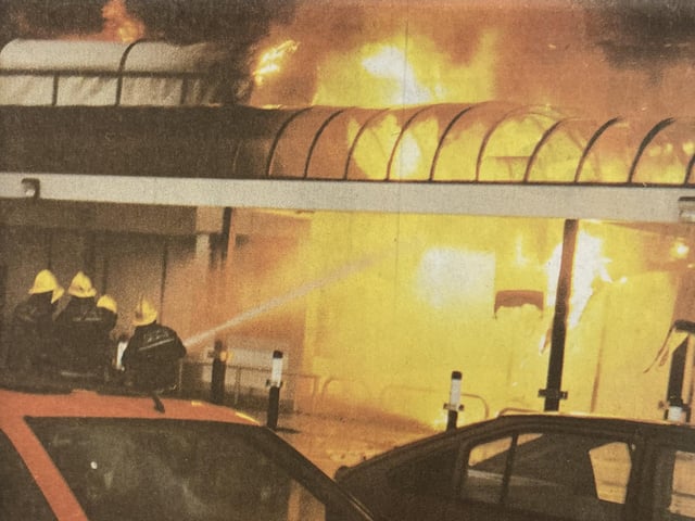 Firemen putting out the blaze.